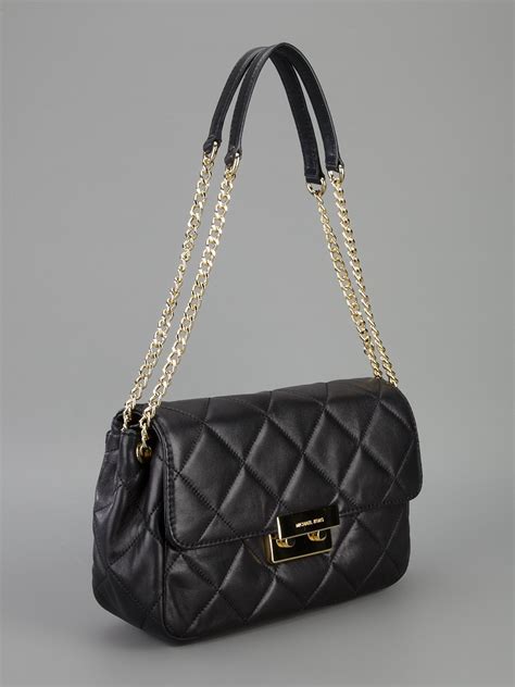 black michael kors bag with gold studs|Michael Kors quilted bag black.